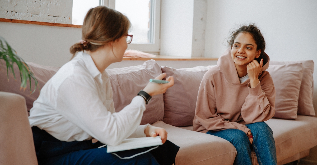 pregnant woman getting mental health therapy