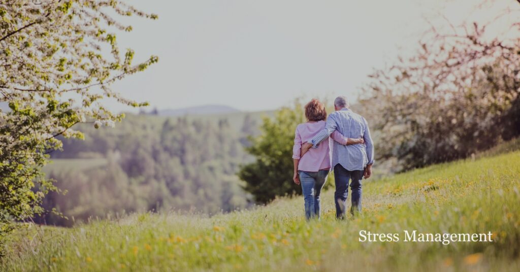 couple walking outside experiencing benefits of nature and nervous system regulation